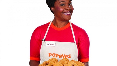 Henry advertising the crunchy chicken of the Popeyes